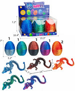 A retail display box and individual views of 3D mesh toy dragon eggs and dragon figures on a white background, with printed dimensions and color options shown.