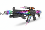 A black toy or prop rifle with colorful LED lighting effects, shown on a white background with a faint Dallas Design Master watermark.