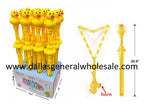 A set of yellow plastic bubble wands designed to look like ducks, including a tube of bubble soap and a display box with the product's website.