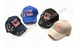 Four baseball caps with 'I ❤️ Jesus' text on a white background.