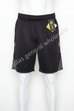 Black athletic shorts with a brand tag on a white background