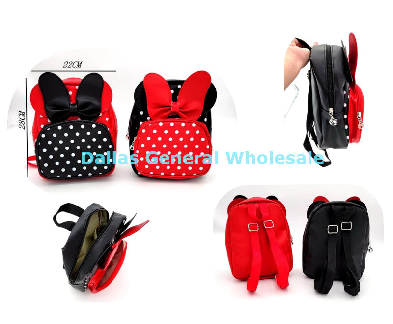 Backpacks with polka dot patterns and bows on a white background, labeled 'Dallas General Wholesale'.