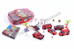 A toy set of red emergency vehicles including a fire truck, ambulance, police car, and helicopter, displayed with a clear plastic storage case, a road map accessory, and small palm tree props on a white background.