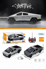 Model car with remote control and packaging on a black background
