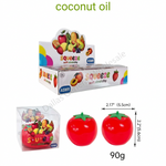 Coconut oil flavored soft stretchy squishies shown with their retail packaging and size measurements. The image features two red tomato-shaped squishies with green stems, a white display box with colorful fruit illustrations, and a clear plastic box containing a bundle of the squishies.
