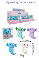 A product listing graphic for a 12-pack of squishy axolotl-shaped toys. The image shows the pink retail display box, a smaller individual packaged toy, and four loose toy figures in blue, mint green, lavender purple, and white, with dimensions and weight text overlaid.