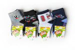 Five pairs of socks with cartoon character labels on a textured surface