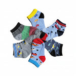 Set of colorful socks with various patterns on a concrete surface