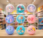 A product listing graphic for a boxed toy set of squishy ball stress toys. The image includes a hand squeezing one of the pink balls, a blue display box, multiple colorful round balls with small animal and flower details, dimensions, weight, and text reading 'Squeezing makes a sound' and '12/box 16box/cs 192pcs'.