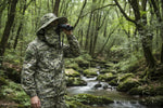 Set of camouflage hats and face masks on a white background
