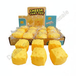 Box of cheese vent toys with packaging and visible text.