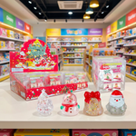 A product listing graphic showing multiple small novelty candle products and packaging on a white background, with text indicating 12/10/12 count, 1644-40SDZHFSL/120PCS, and coconut oil. The candles are shaped like Christmas trees, snowmen, and Santa Claus figures in clear, white, and glittery finishes, with dimensions and weights listed beside each item.