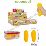 Coconut oil toy set shown with a display box, a clear container of yellow coconut oil candies, a hand holding a yellow toy piece, and size/weight annotations on a white background.