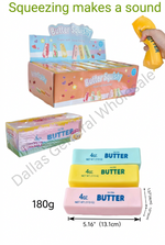 A composite product listing graphic for Butter Squeezing candy. It shows retail display boxes, a hand holding a yellow squeeze bottle, individual candy bars in pastel pink, yellow, and blue, packaging dimensions, weight (180g), and box quantity text on a white background.