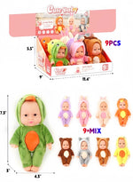 A retail display box and individual views of cute baby dolls in animal costumes, with dimensions and quantity text overlaid. The dolls include green dinosaur, pink bunny, brown bear, gray cat, and yellow monkey outfits, shown as a 9-piece mix.