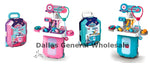 Two toy kitchens, one pink and one blue, with 'Dallas General Wholesale' branding.