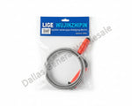 A packaged sewer pipe dredging device with a coiled metal cable and orange-red handles, sealed in a clear plastic bag with a blue header card reading LIGE WUJINZHIPIN, on a white background.