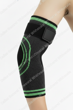 Black knee brace with green accents on a white background