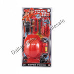 A packaged toy tool set in clear blister packaging with printed graphics and dimensions shown around it. The set includes a large red helmet-like tool, red handles, black and silver tools, and a red fire extinguisher-style piece, with text listing item number, pack size, weight, and case measurements.