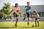 Three children playing soccer on a grassy field outdoors, with a Dallas General Wholesale watermark across the center.