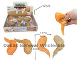 A 12-piece set of fried chicken squishy toys shown in a retail display box, with a hand holding one orange squishy on the right, and dimensions labeled on several pieces. The image includes a large 'Dallas General Wholesale' watermark across the bottom.