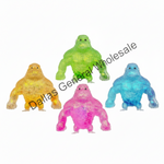 Four colorful gorilla figurines on a white background