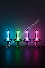 Four pixel-art sword-shaped LED light signs glowing in blue, green, purple, and pink, arranged in a row on a dark reflective surface against a dark gradient background.