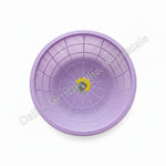 Purple plastic basket on a concrete floor with a blue basket in the background.