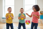 Three children laughing and playing in a bright children's room, each holding a large yellow toy dumbbell. A translucent watermark reading 'Dallas General Wholesale' is overlaid across the center.