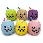 Set of colorful boba drink-shaped containers with faces on a white background