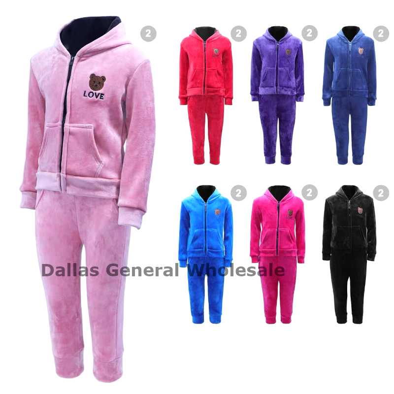 Collection of colorful fleece tracksuits with a bear emblem and 'LOVE' text on a white background.