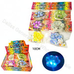 Assorted 'Pinch Fables' toys in packaging with a close-up of a glowing toy.