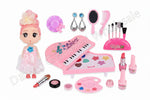 Toy makeup set with packaging and accessories on a pink background