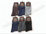 Packaged dress socks in black, blue, and gray on a white background