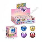 A product catalog graphic for 'Decompress Rotate Ball' fidget toys, showing a pink retail display box, a smaller retail box, and four individual balls in blue, purple, gold, and red. The image includes dimensions, weight, and item number details on a pink and light blue gradient background.