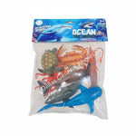 Pack of 48 ocean-themed toy fishing lures in a clear plastic bag with a blue header card. The lures include a blue shark, orange crab, green turtle, and other sea creatures.