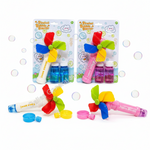 Three colorful pinwheel bubble blisters on a white background, with two packaged units at the top and one unpackaged unit at the bottom. The products feature red, green, blue, and yellow pinwheels, white and pink bodies, and small bubble bottles.