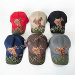 Six baseball caps with a common design on a concrete surface