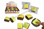 A collage showing a boxed set of squishy foam food-shaped toys, individual pieces in clear packaging, multiple pieces, dimensions, and a hand pressing one toy to demonstrate its soft, squishy texture. The toys are designed to look like sandwich cookies with yellow tops and dark brown sides.