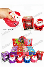 A hand holds a red Santa Claus-shaped squishy toy in the top left, with size text reading 8.5x8.