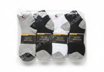 Pack of socks with labels on a wooden floor
