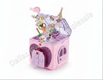 Special Treasure Chest toy with packaging on a pink background