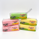 Four packaged sticks of Squishy Butter arranged in a pyramid on a white background. The top and middle packages are clear plastic wrapping around green and yellow butter sticks, while the bottom packages are pink and yellow.