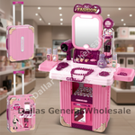 Pink toy vanity playset with a mirror, makeup accessories, and matching pink suitcase-style storage units shown in a store-like setting. A large 'Dellar General Wholesale' watermark overlays the image.