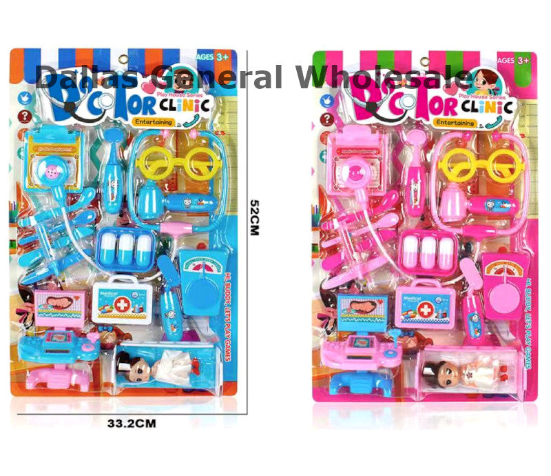 Two packages of toy doctor sets, one blue and one pink, with toy medical tools and a toy patient figure.