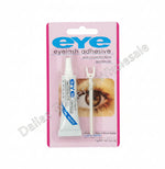 Eyelash adhesive packaging on a concrete surface