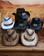 Six cowboy hats in various colors (black, white, brown, tan) arranged on a rustic wooden table with a desert landscape backdrop. A diagonal watermark reads 'Dallas General Wholesale'.