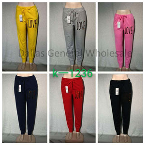 https://www.dallasgeneralwholesale.com/cdn/shop/products/CHEAP-BULK-WHOLESALE-GIRLS-WOMEN-ASSORTED-SOLID-COLOR-CASUAL-SWEAT-PANTS-WITH-GOLD-LOVE-DESIGNS-1_300x300.jpg?v=1611801772