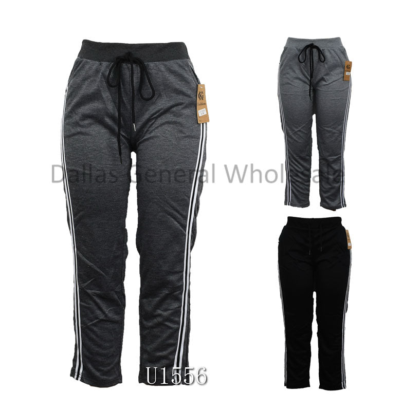 https://www.dallasgeneralwholesale.com/cdn/shop/products/CHEAP-BULK-WHOLESALE-LADIES-WOMEN-GIRLS-SOLID-COLOR-SUMMER-SPRING-STYLE-CASUAL-TRACK-PANTS-1.jpg?v=1611719591